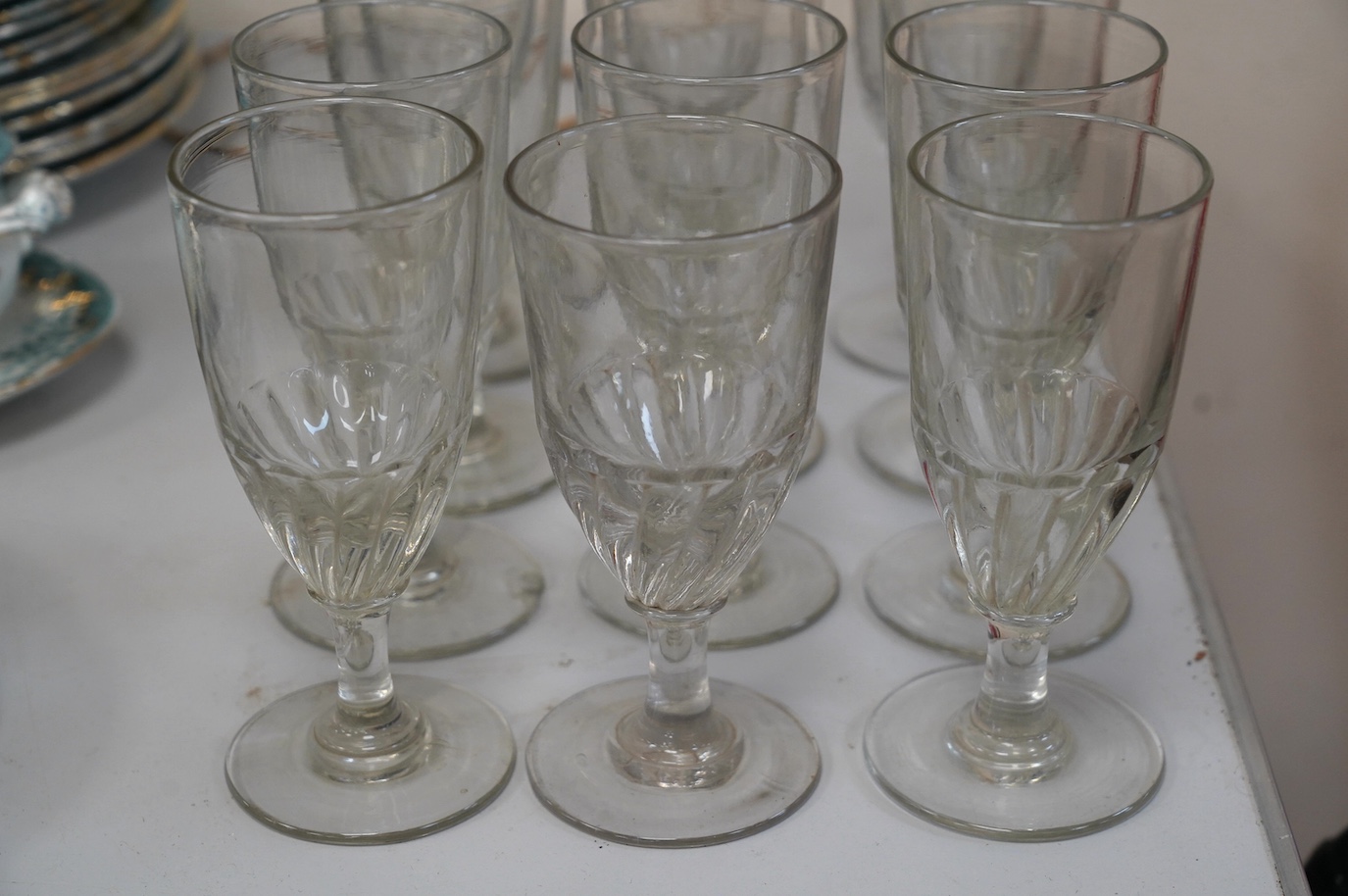 A set of twelve 19th century wine glasses, 17.5cm. Condition - one has large chip to foot rim